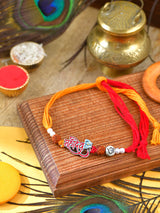 Mahadev Rudraksh Rakhi with metal charm and Rudraksha beads on a thread cord