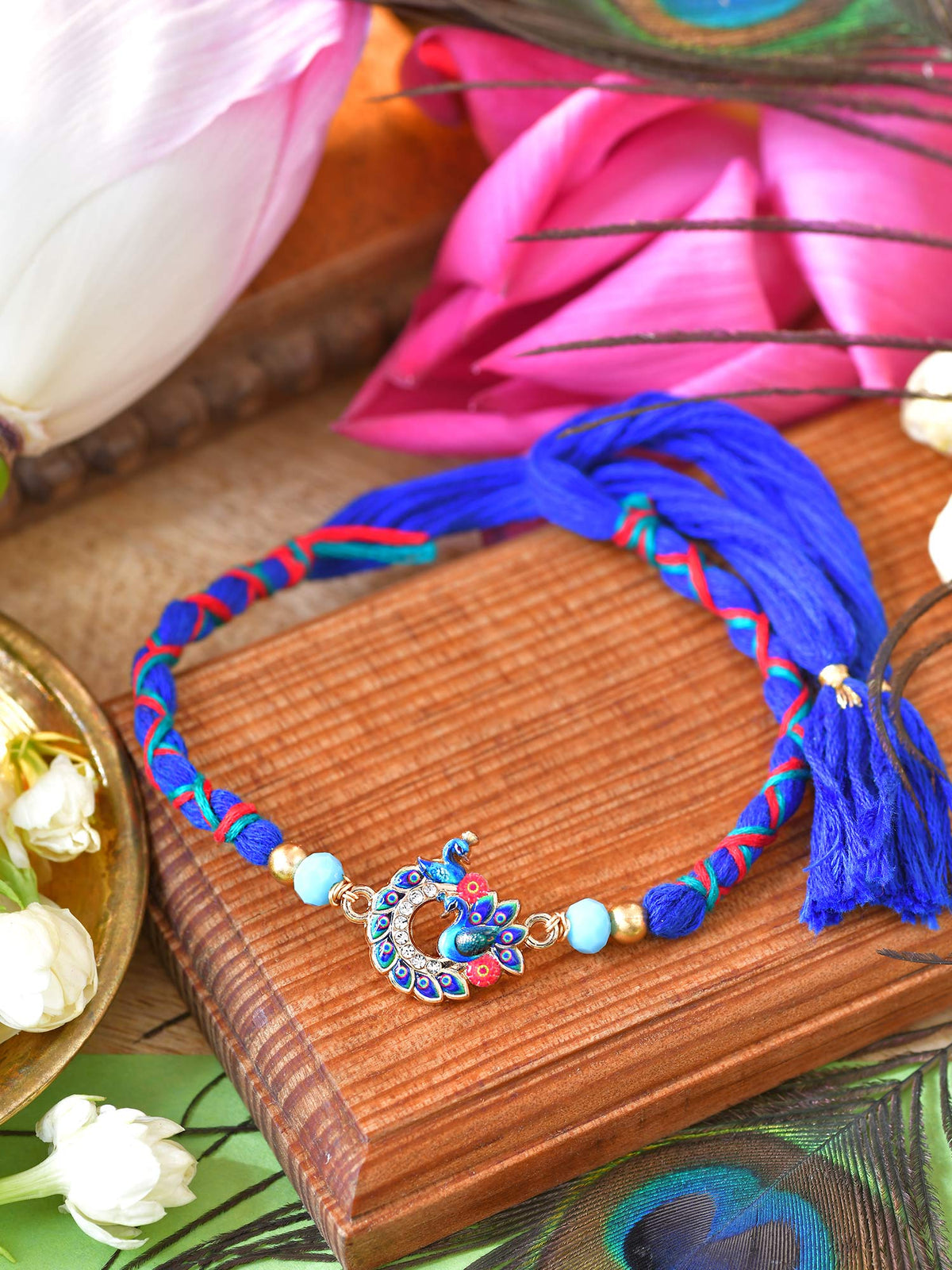 Peacock stone weaved Rakhi with peacock stone and weaved thread cord