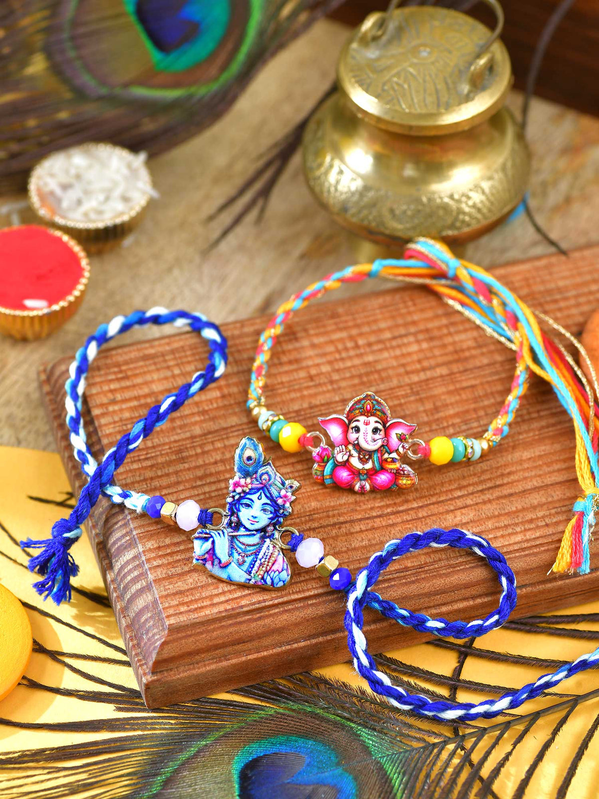 Ganesha Krishna charm Rakhis set of 2 with Ganesha and Krishna charms