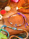 Peacock charm Rakhis set of 2 with peacock charms on thread cords