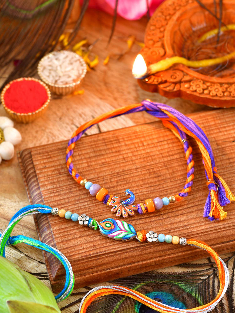 Peacock charm Rakhis set of 2 with peacock charms on thread cords