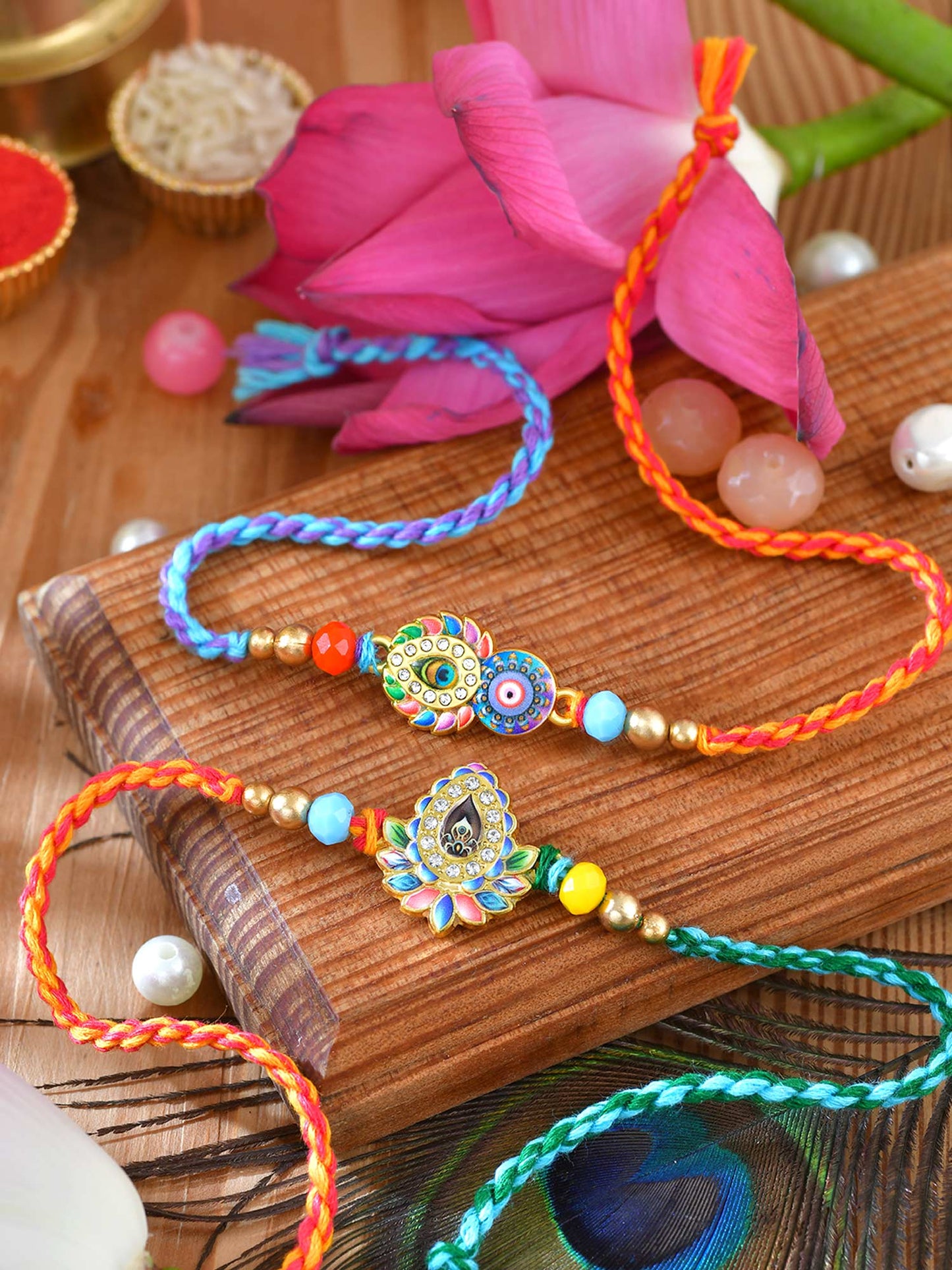 Minakari stone Rakhis set of 2 with Minakari stone detailing on thread cords