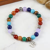 Seven Chakra Om beaded smart bracelet, laid flat