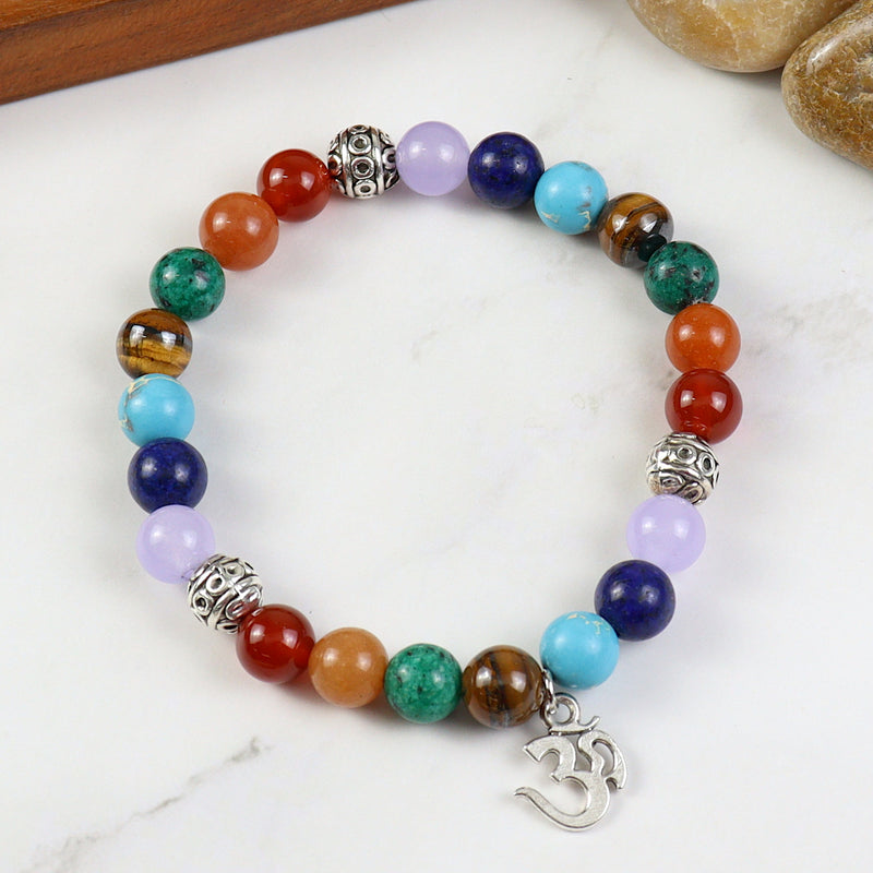 Seven Chakra Om beaded smart bracelet, laid flat