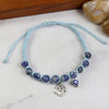 Om Evil Eye beaded smart bracelet, laid flat
