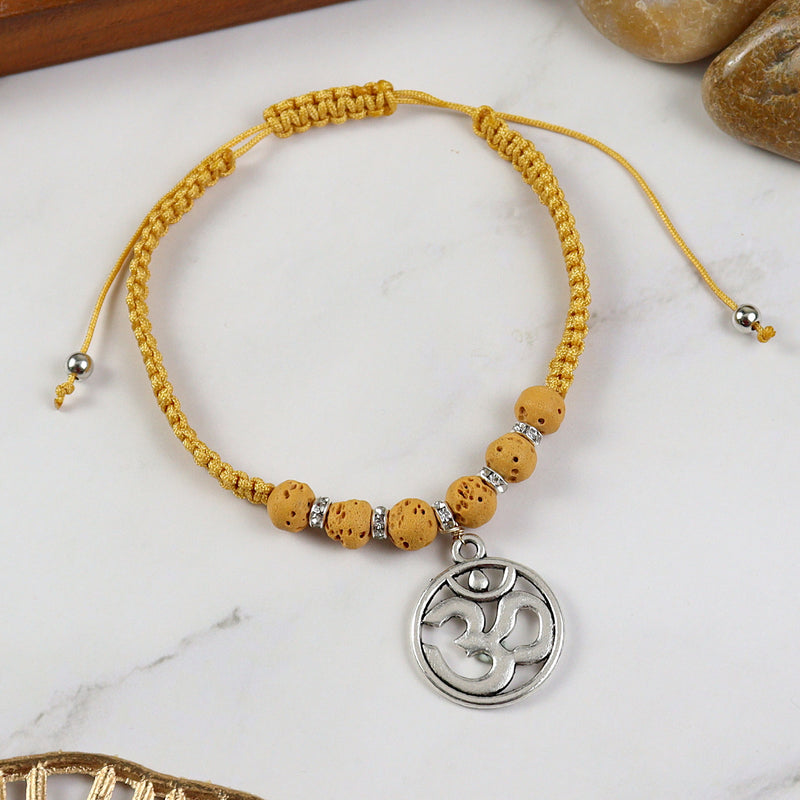 Beaded Om smart bracelet, laid flat