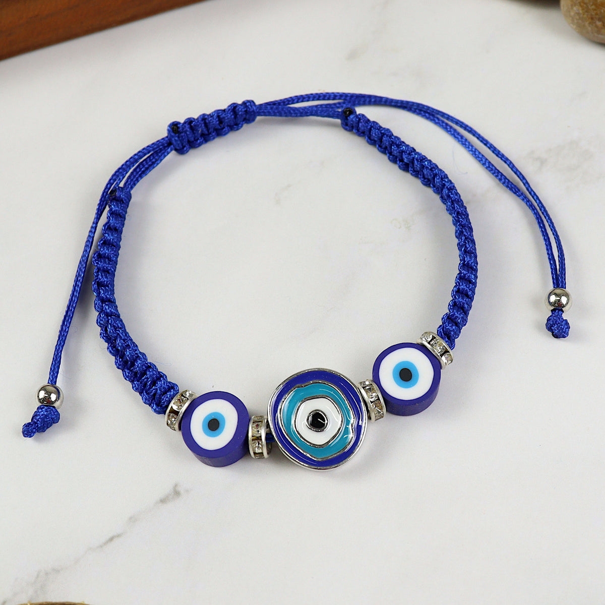 Evil Eye charm beaded woven smart bracelet, laid flat