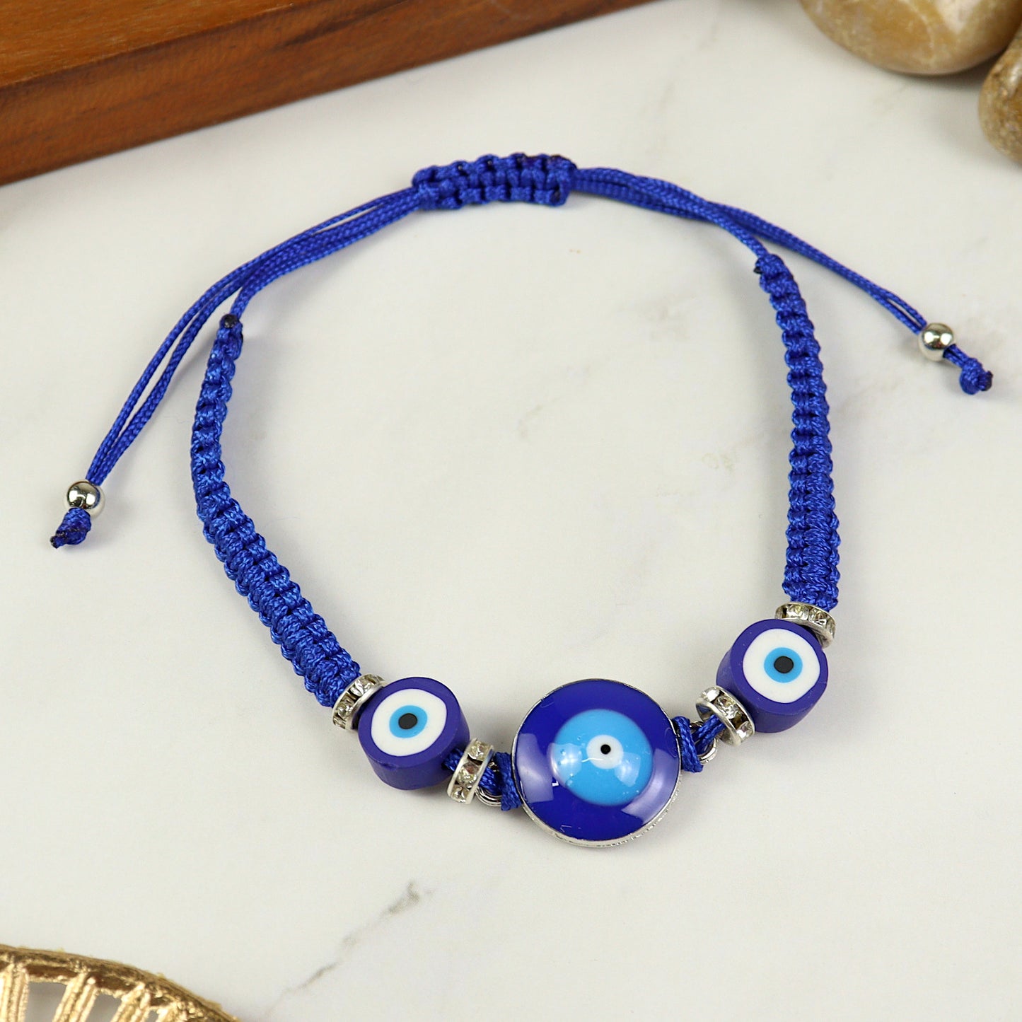 Woven Evil Eye charm smart bracelet, laid flat