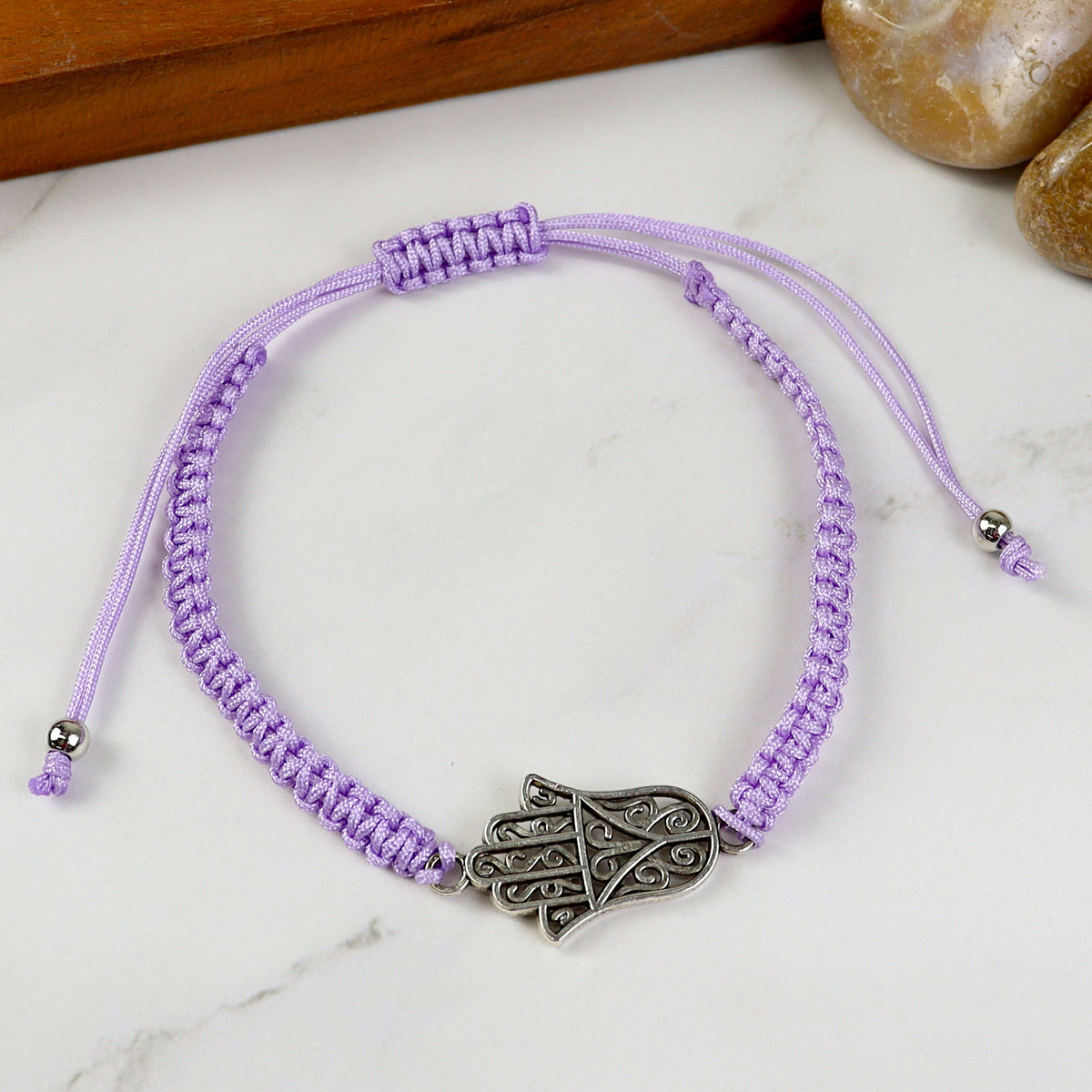 Hamsa charm beaded smart bracelet, laid flat
