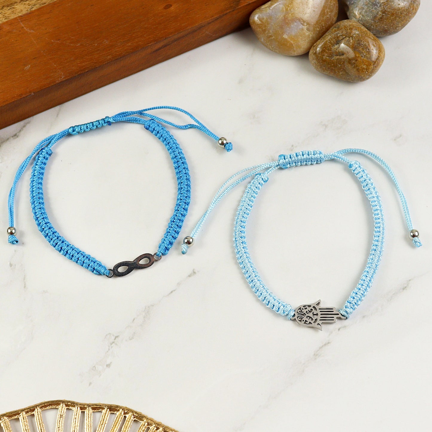 Infinity Hamsa charm smart bracelet set — two beaded bracelets, laid flat