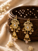 Paisley Kundan earrings with soft pink stone and pearl beads, gold-toned, laid flat