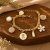 Multi charm mother of pearl bracelet on an adjustable chain, laid flat