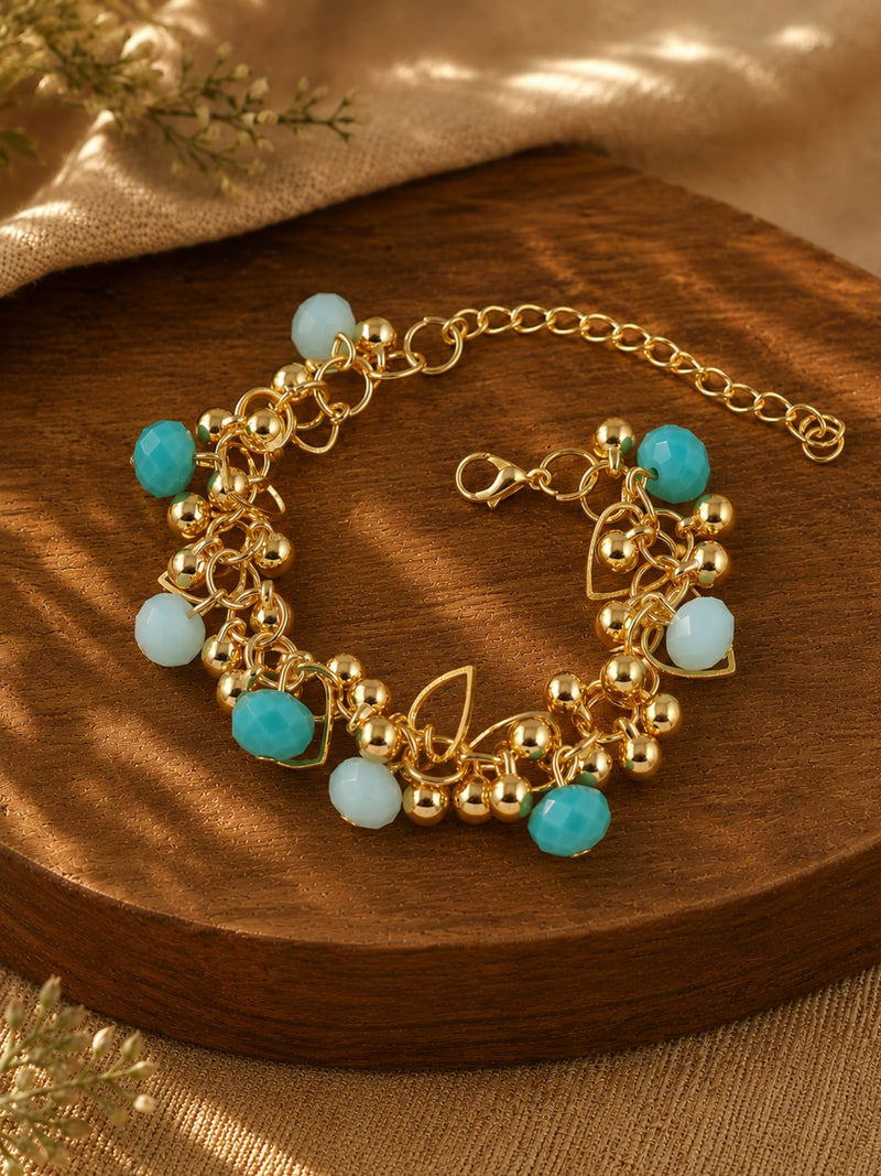 Gold tone chain beaded bracelet on an adjustable chain, laid flat