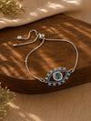 Evil eye diamond pendant bracelet on a chain, laid flat