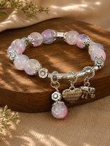 Love and elephant charm beaded bracelet, laid flat