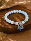 Evil eye charm beaded bracelet, laid flat