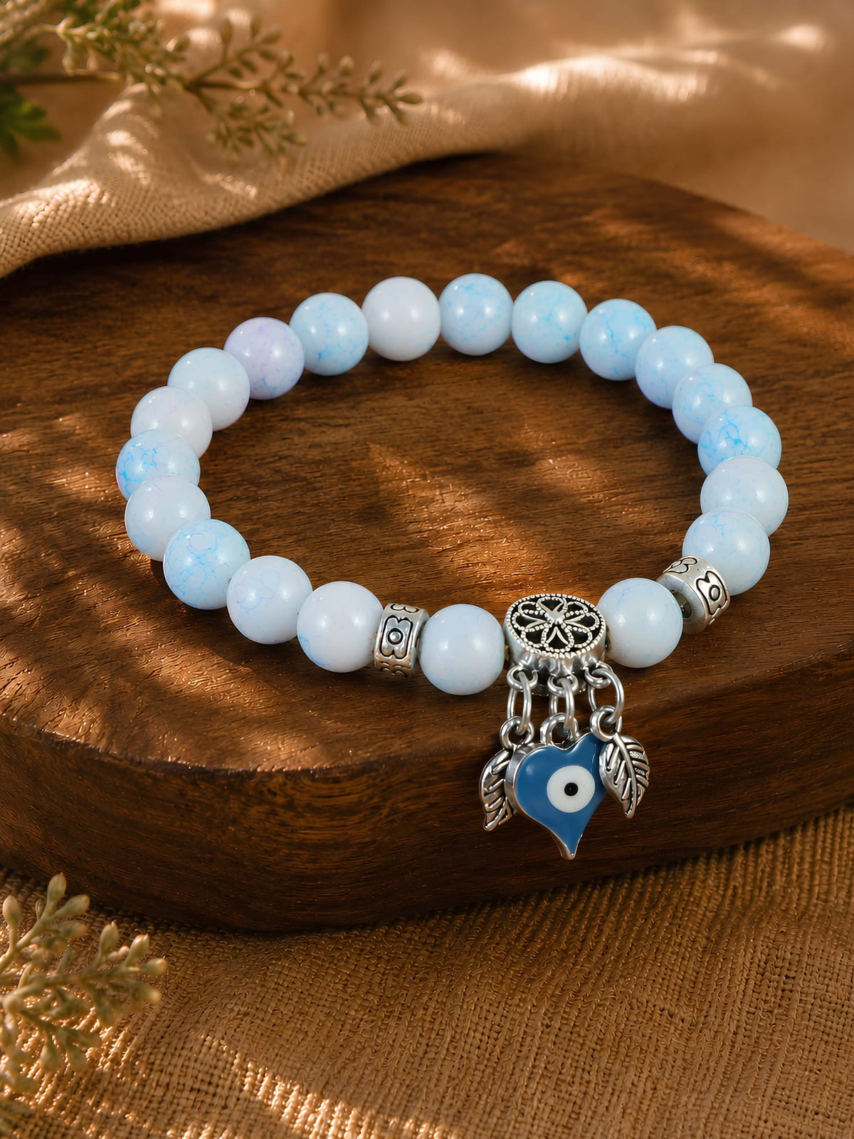 Evil eye charm beaded bracelet, laid flat