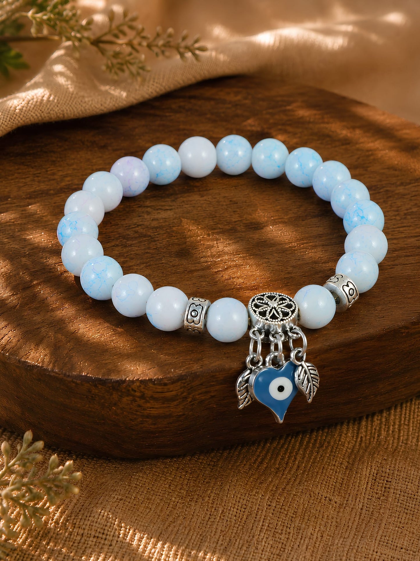 Evil eye charm beaded bracelet, laid flat