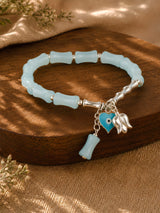 Evil eye charm beaded bracelet, laid flat
