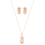 Close-up of the enamel floral charm and crystal setting on the pendant