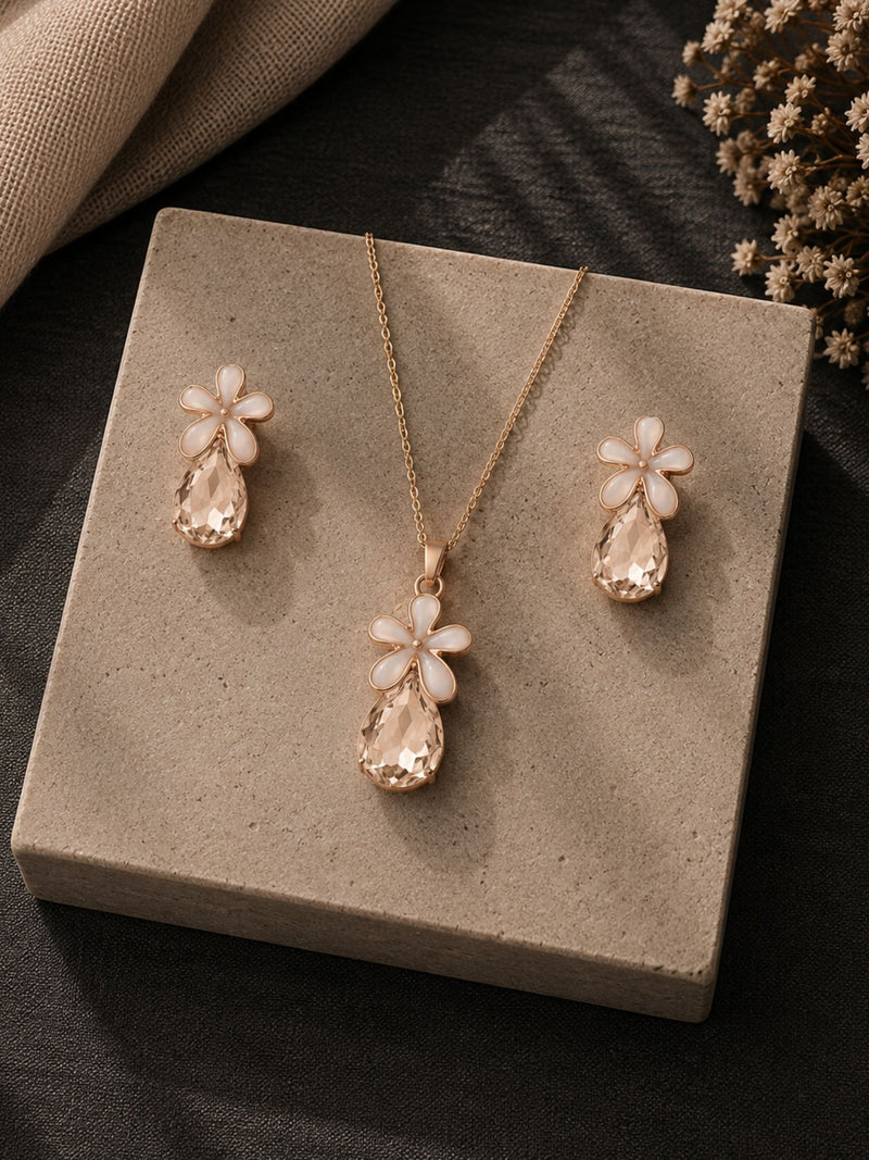Golden crystal jewellery set — necklace and earrings laid flat