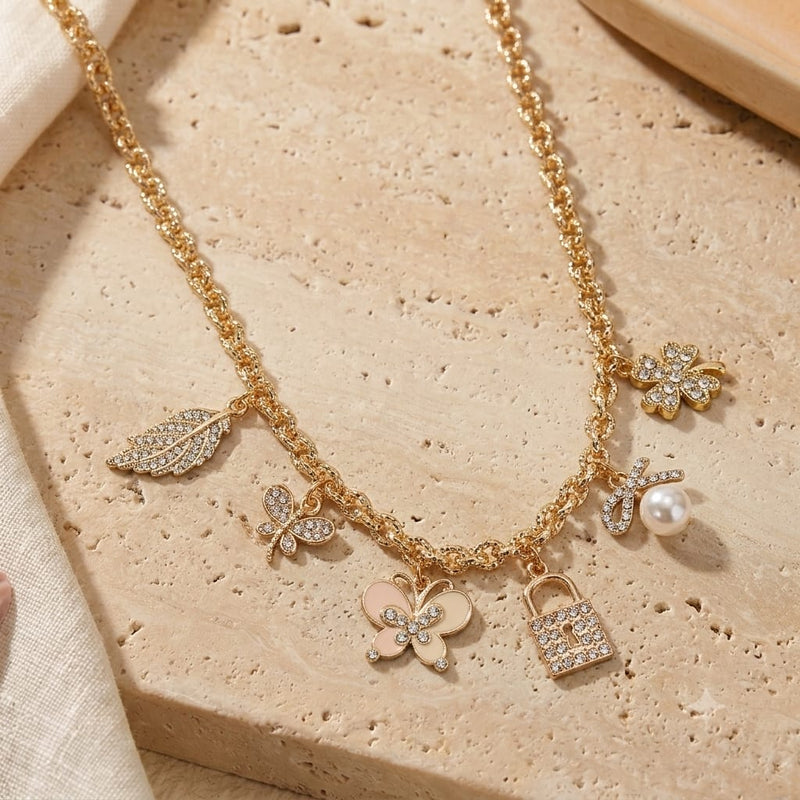 Diamond Stone multi-charm necklace on a chain, laid flat