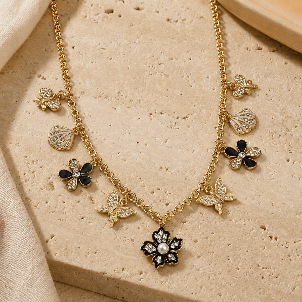 Diamond Stone charm necklace on a chain, laid flat