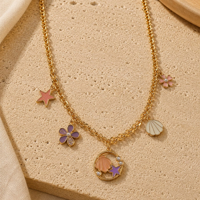 Sea World charm necklace on a chain, laid flat