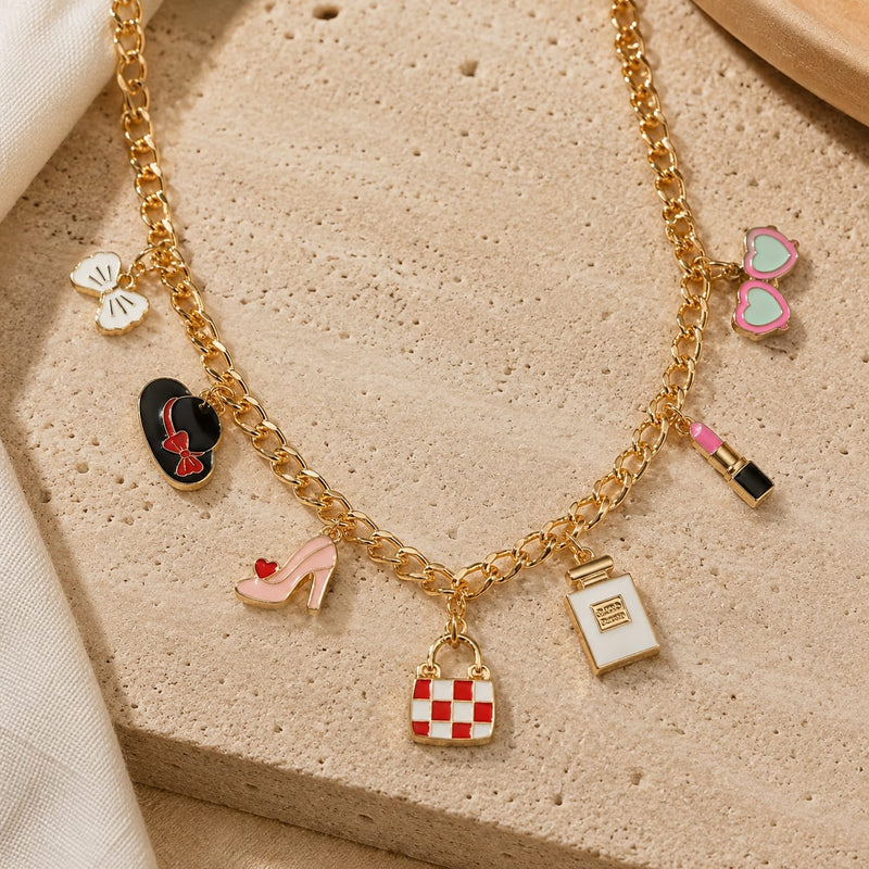 Fashion World multi-charm necklace on a chain, laid flat