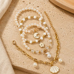 Moon charm bracelet set of 4, beaded and chain styles, laid flat