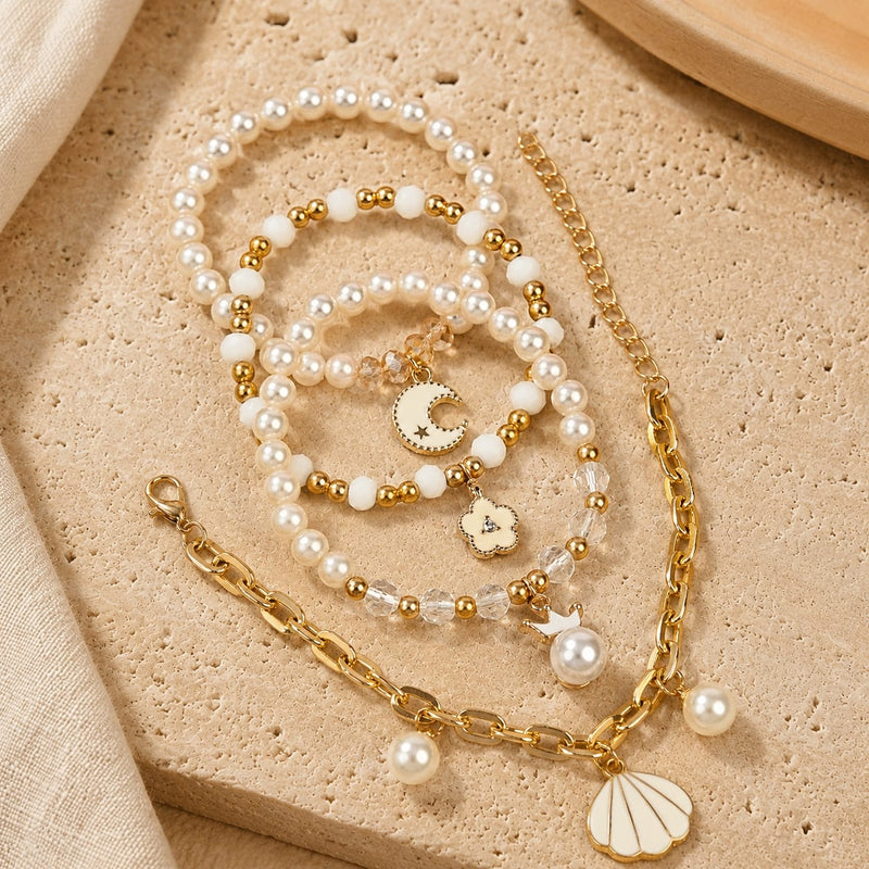 Moon charm bracelet set of 4, beaded and chain styles, laid flat