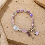 Lavender beaded Swan charm bracelet, laid flat