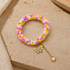 Multicolour beaded Butterfly charm bracelet, laid flat