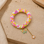 Multicolour beaded Butterfly charm bracelet, laid flat