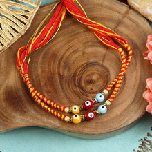Load image into Gallery viewer, Set of of 2 Evil Eye Bead Fancy Thread Rakhis
