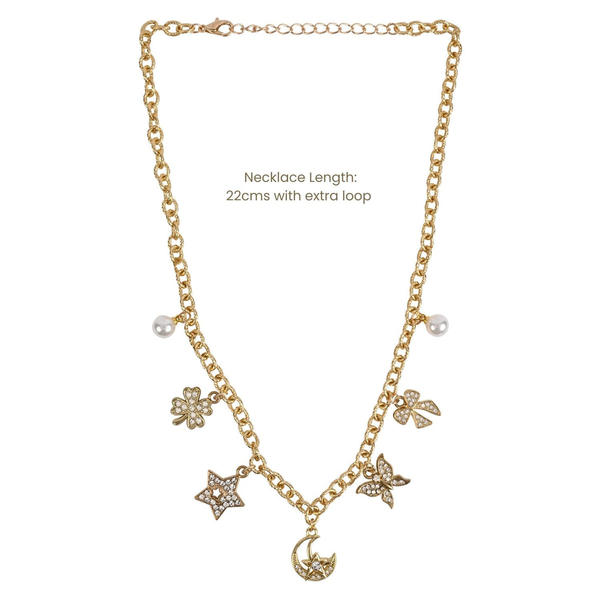 Gold chain necklace with dangling charms including flowers, stars, a crescent moon, and pearl-like beads, shown on a white background with text stating necklace length 22cms with extra loop.