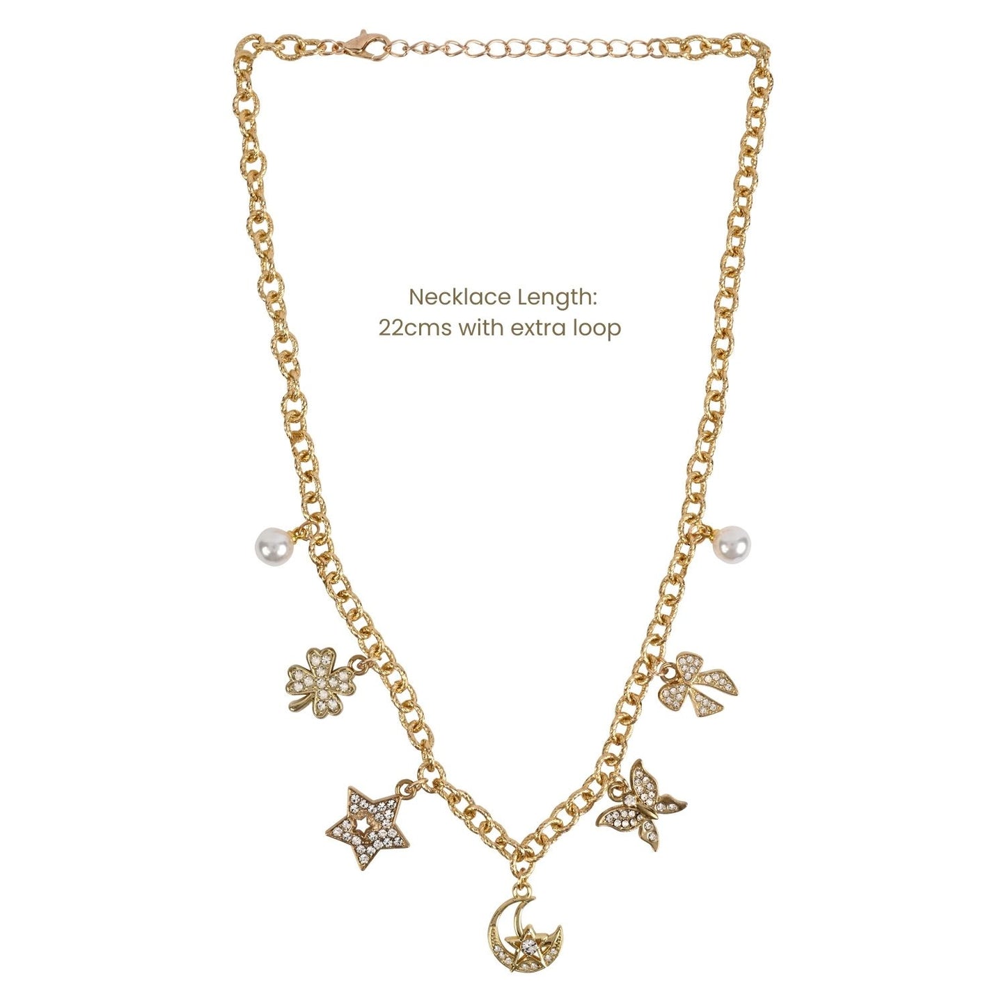 Gold chain necklace with dangling charms including flowers, stars, a crescent moon, and pearl-like beads, shown on a white background with text stating necklace length 22cms with extra loop.